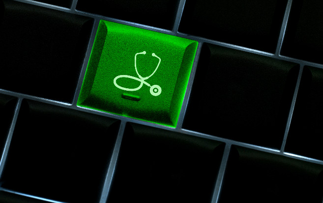 computer_keyboard_with_stethoscope_key_online_medicines_email_internet
