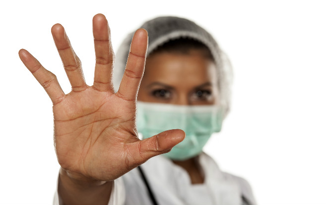 hand_raised_five_fingers_stop_gesture_protective_mask_nurse